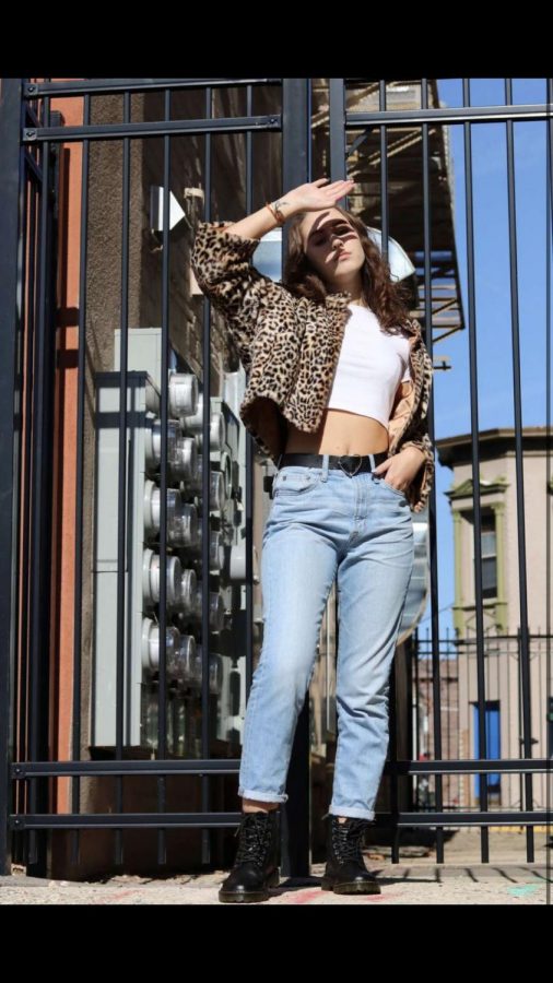 Sophie Kroener, a sophomore, wears a 90s look featuring mom jeans and Doc Martens